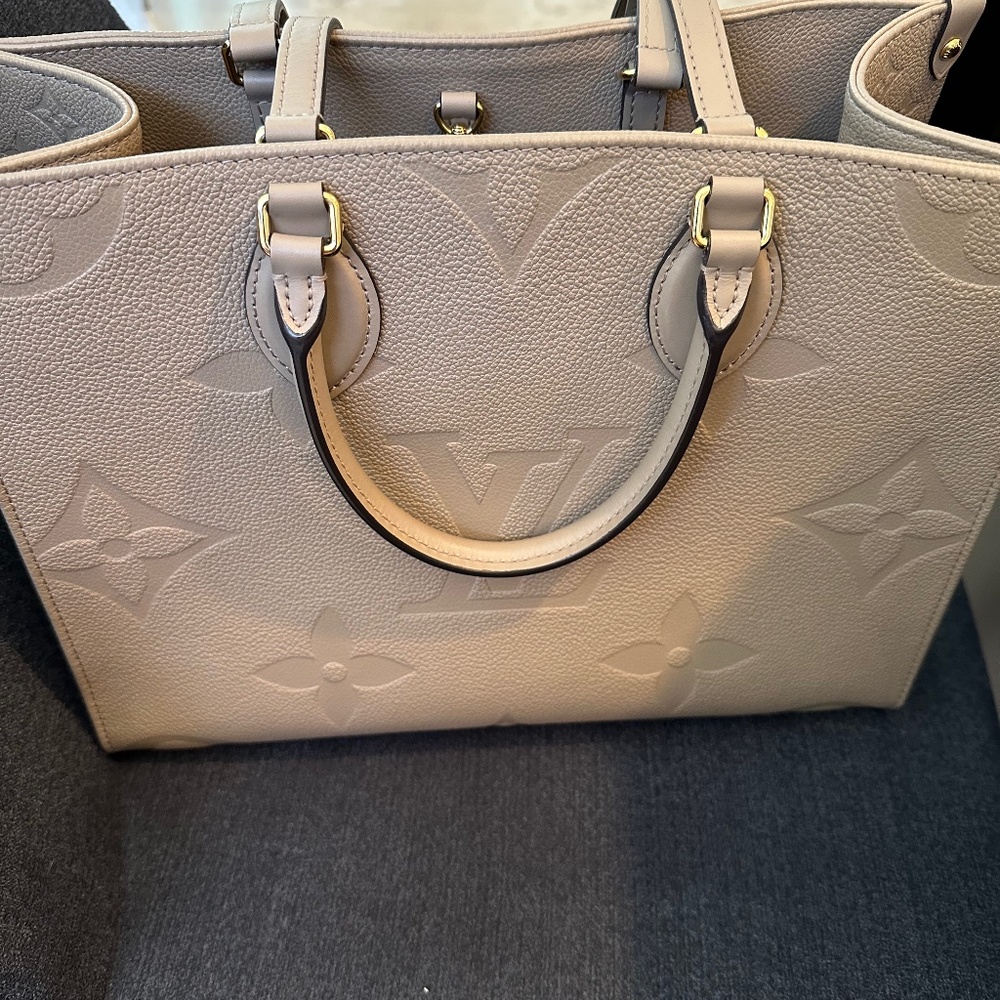 Louis Vuitton MM on the go